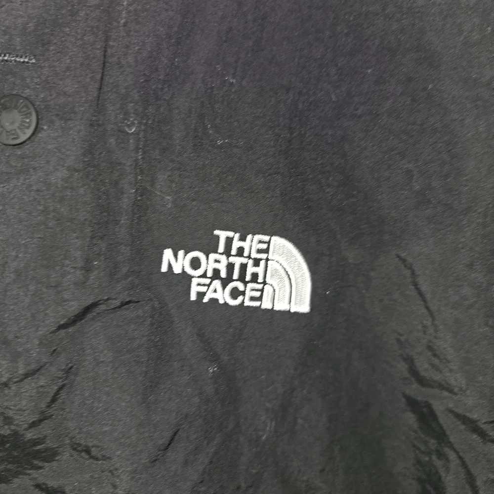 The North Face Men's Black‎ and Navy Performance Jacket